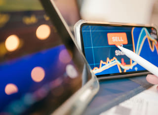 Multi-market trader analysing Bitcoin, Ethereum and forex options